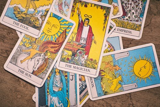 Colorful tarot cards laid out for a spiritual reading, showcasing intriguing designs.